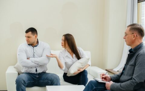 a-young-married-couple-of-men-and-women-talk-to-a-psychologist-at-a-therapy-session-psychology_180601-9019