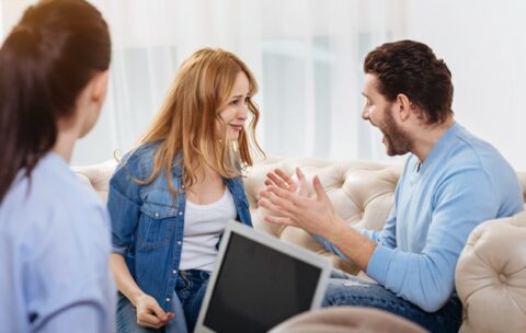 family-fight-furious-handsome-bearded-man-looking-at-his-wife-and-shouting-at-her-while-sitting-in-the-psychologists-office_259150-13713