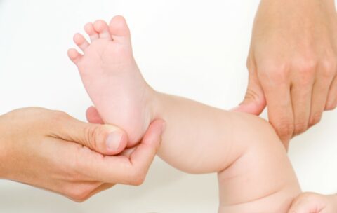 making massage of child's foot